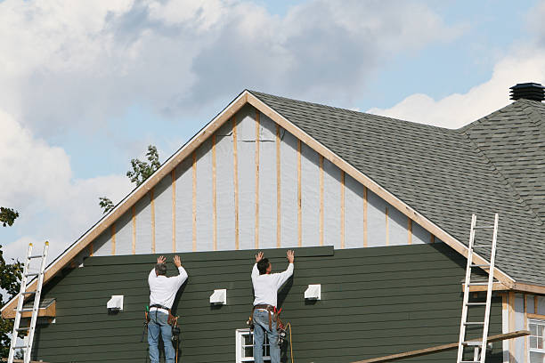 Professional Siding Repair technician working in Rogers, TX